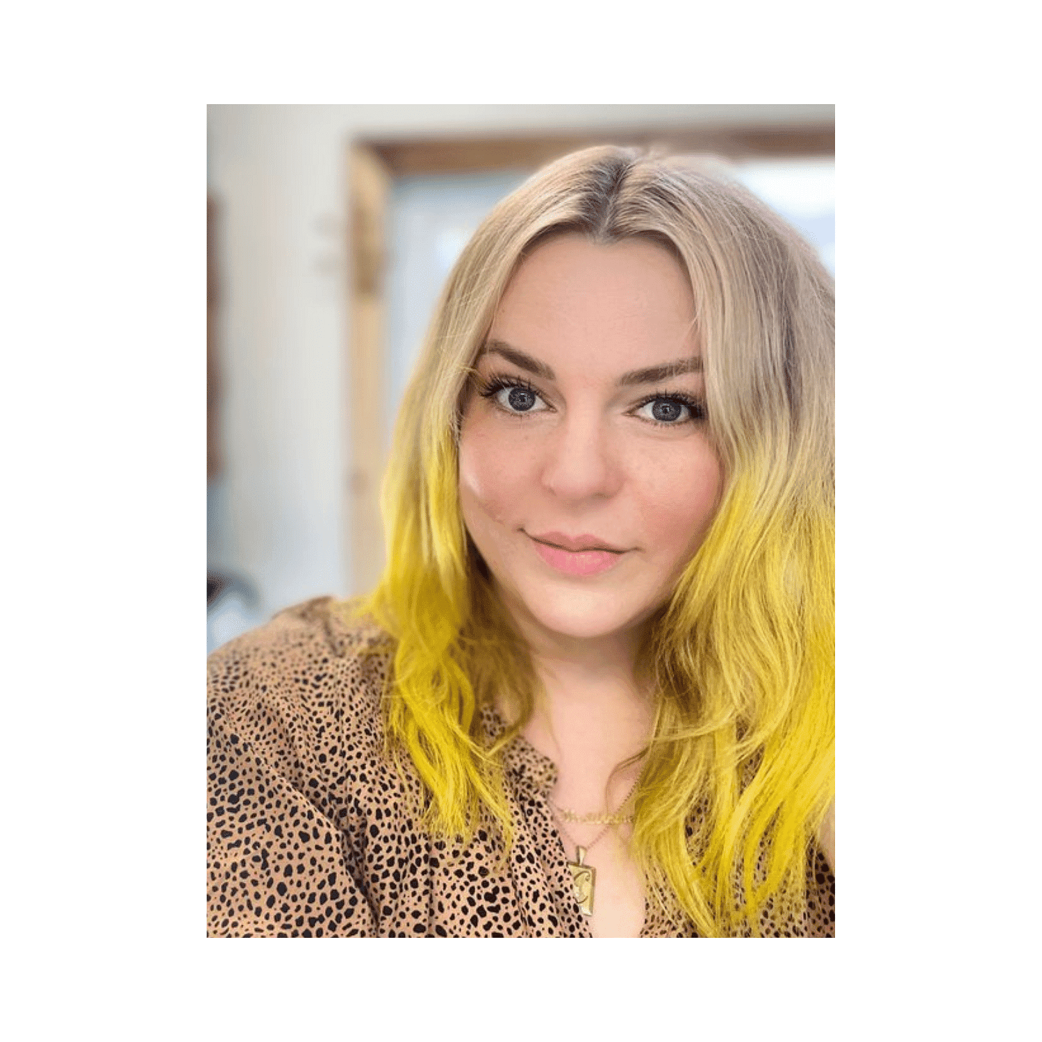 Portrait of Corinne, a professional stylist at Park & Eve: Hair Studio, showcasing their expertise and style.